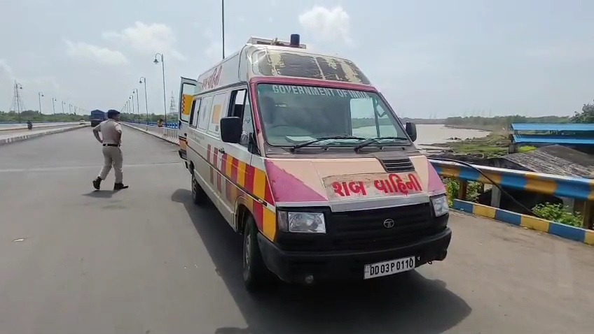 Government ambulance and police at the scene